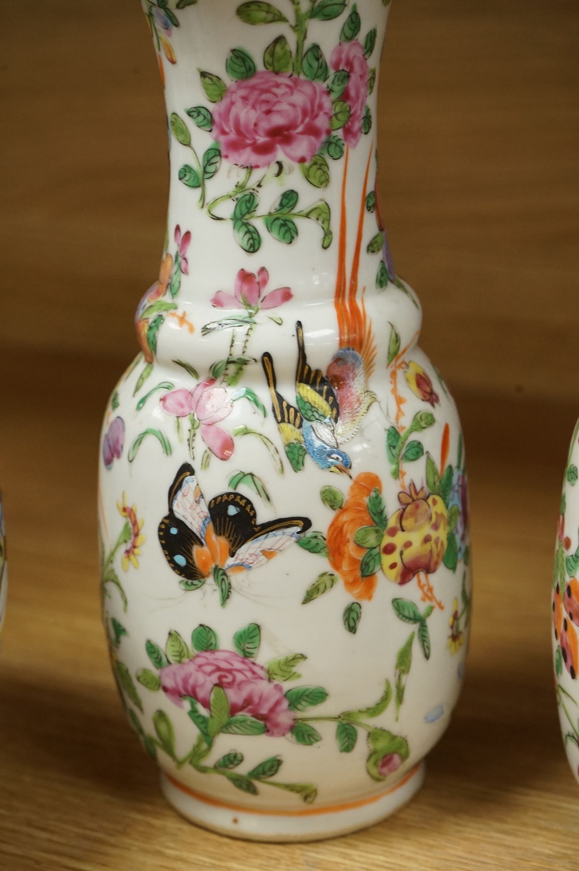 A Chinese 'Thousand Flower' jar, two famille rose vases, and a Republic period jar and cover, largest 19cm high